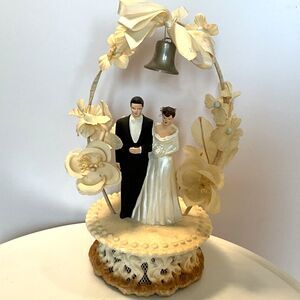 Stunning vintage wedding cake topper; silk bow, chalkware figures dated 1958